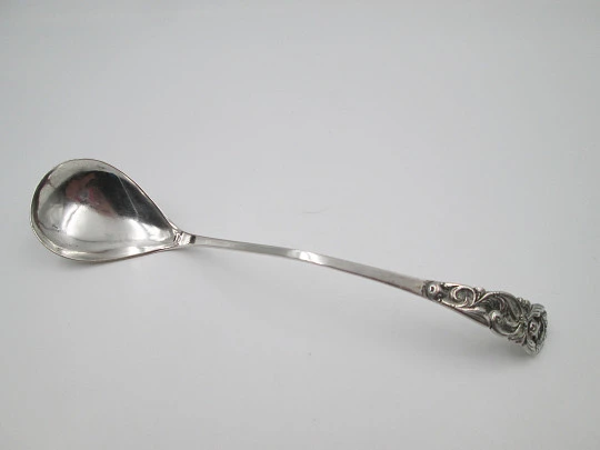 Long serving spoon. 800 sterling silver. Curved handled. Flowers and leaves. 1970's