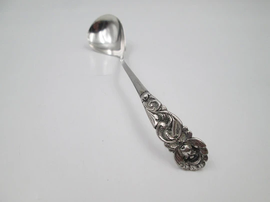 Long serving spoon. 800 sterling silver. Curved handled. Flowers and leaves. 1970's