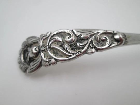 Long serving spoon. 800 sterling silver. Curved handled. Flowers and leaves. 1970's