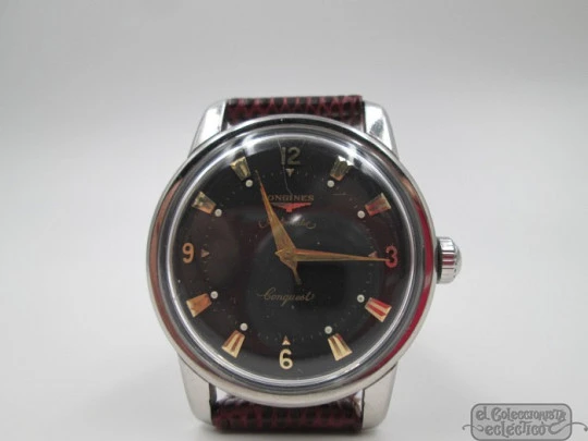Longines Conquest. Stainless steel. Automatic. Black dial. 1950's. Brown strap Longines Conquest. Stainless steel. Automatic. Black dial. 1950's. Brown strap