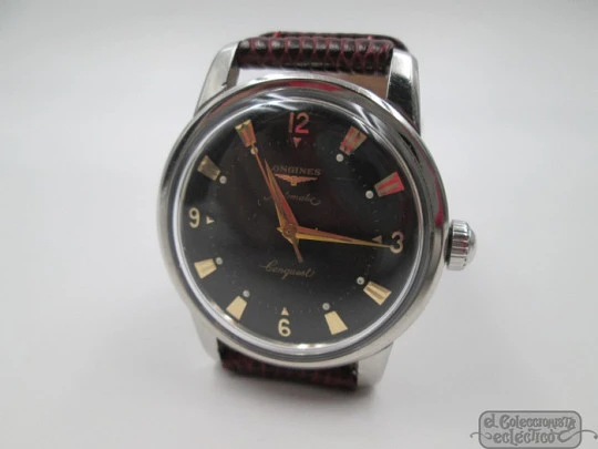 Longines Conquest. Stainless steel. Automatic. Black dial. 1950's. Brown strap Longines Conquest. Stainless steel. Automatic. Black dial. 1950's. Brown strap