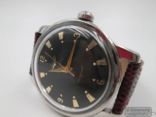 Longines Conquest. Stainless steel. Automatic. Black dial. 1950's. Brown strap Longines Conquest. Stainless steel. Automatic. Black dial. 1950's. Brown strap