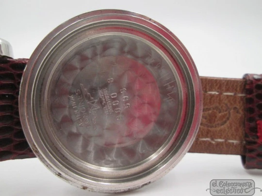 Longines Conquest. Stainless steel. Automatic. Black dial. 1950's. Brown strap Longines Conquest. Stainless steel. Automatic. Black dial. 1950's. Brown strap