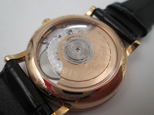 Longines Elegant. Oro rosa 18 quilates. Automático. Fondo vista. Calendario. Estuche