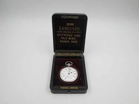 Longines open-faced pocket watch. Chromed steel. Manual wind. Wood box. 1960's. Swiss