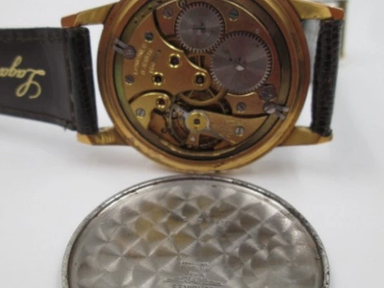 Longines. Acero / chapado oro 20 micras. Fecha. Segundero. Cuerda. 1950