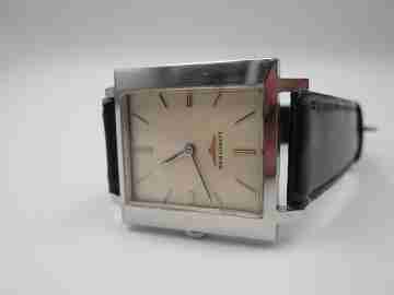 Longines. Acero. Caja rectangular. Cuerda manual. Correa. 1970