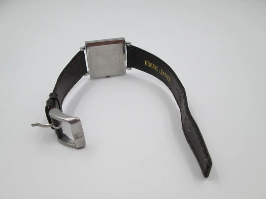 Longines. Stainless steel. 1960's. Manual wind. Rectangular case. Strap