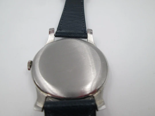 Longines. Stainless steel. 1960's. Manual wind. Seconds hand. Strap. Swiss