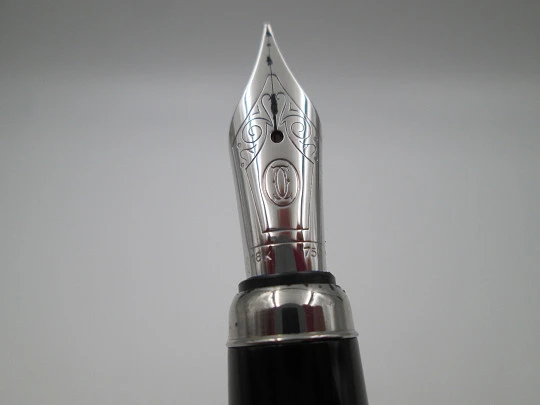 Louis Cartier Stripe fountain pen. Palladium-plated metal and black resin. 2000's. France Louis Cartier Stripe fountain pen. Palladium-plated metal and black resin. 2000's. France