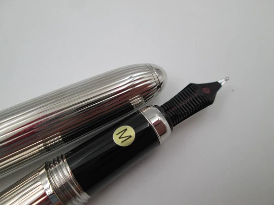 Louis Cartier Stripe fountain pen. Palladium-plated metal and black resin. 2000's. France Louis Cartier Stripe fountain pen. Palladium-plated metal and black resin. 2000's. France