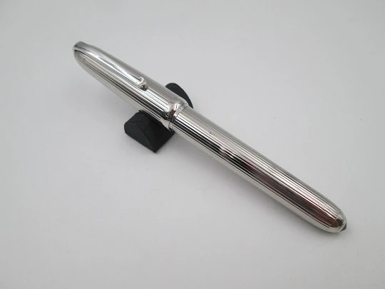 Louis Cartier Stripe fountain pen. Palladium-plated metal and black resin. 2000's. France Louis Cartier Stripe fountain pen. Palladium-plated metal and black resin. 2000's. France