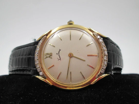 Lucien Piccard. 18k yellow gold and diamonds. Manual wind. Swiss