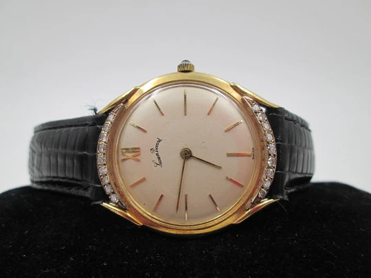 Lucien Piccard. 18k yellow gold and diamonds. Manual wind. Swiss