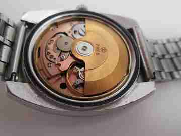Luxor Tiros. Acero inoxidable. Automático. Brazalete. Día y fecha. 1970. Suiza