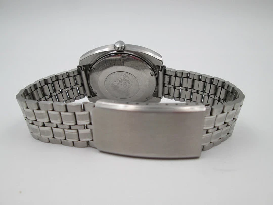 Luxor Tiros. Stainless steel. Automatic. Date & day. Bracelet. Swiss. 1970's