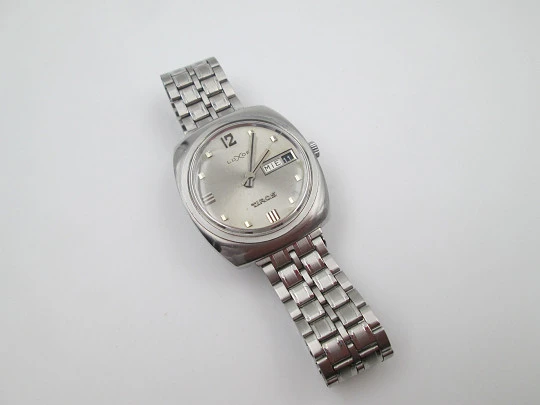 Luxor Tiros. Stainless steel. Automatic. Date & day. Bracelet. Swiss. 1970's