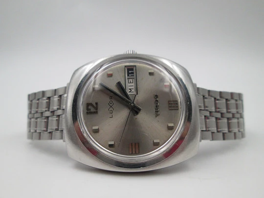 Luxor Tiros. Stainless steel. Automatic. Date & day. Bracelet. Swiss. 1970's