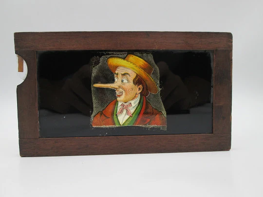 Magic lantern mechanical slide. Single slipping slide. Man with blue eyes. Europe. 1890's