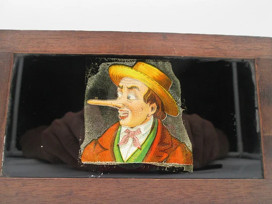 Magic lantern mechanical slide. Single slipping slide. Man with blue eyes. Europe. 1890's