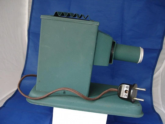 Magic lantern. Green lacquered metal. Two slides. Electric. 1950's