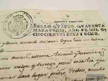 Manuscript 1818. Tomás Subiñas testament. Two tax seals