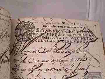 Manuscript. 1750. Judicial sale house. Málaga. Parchment covers