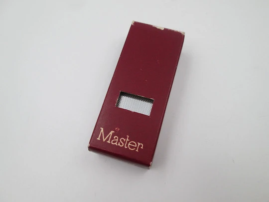 Master petrol pocket lighter. Silver plated metal. Rhomboid pattern. Box. Swiss. 1970's