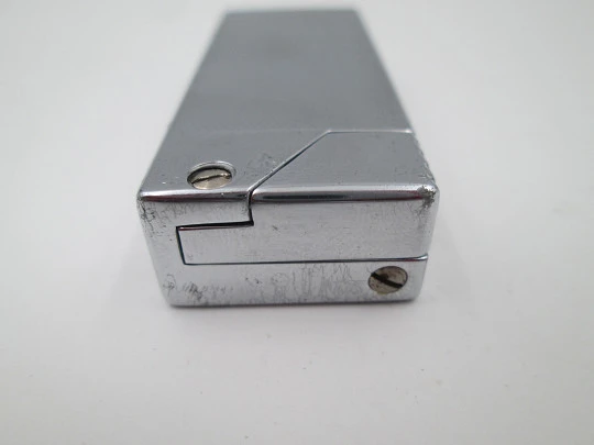 Master petrol pocket lighter. Silver plated metal. Rhomboid pattern. Box. Swiss. 1970's