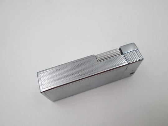 Master petrol pocket lighter. Silver plated metal. Rhomboid pattern. Box. Swiss. 1970's