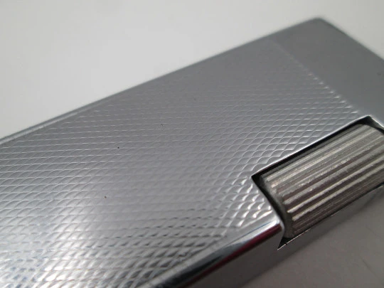 Master petrol pocket lighter. Silver plated metal. Rhomboid pattern. Box. Swiss. 1970's
