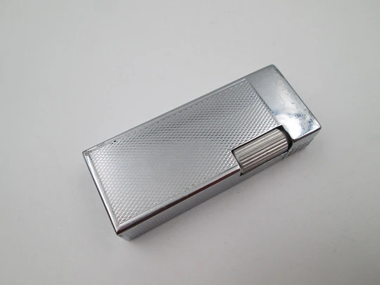 Master petrol pocket lighter. Silver plated metal. Rhomboid pattern. Box. Swiss. 1970's