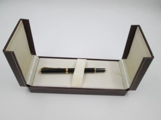 Maurice Lacroix. Black lacquer & 23k gold plated details. Box and warranty