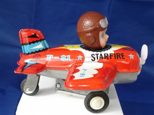 Mechanical aircraft Star Fire P-81. Tinplate. Kanto Toys. 1950's. Clockwork