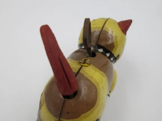 Mechanical bulldog with boot. Wind-up. Japan. 1950's. Lithographed tinplate