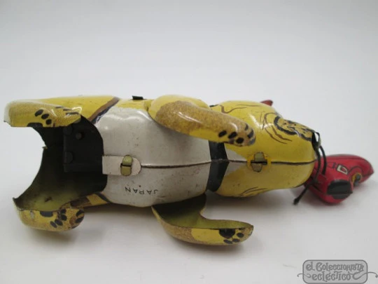 Mechanical bulldog with boot. Wind-up. Japan. 1950's. Lithographed tinplate
