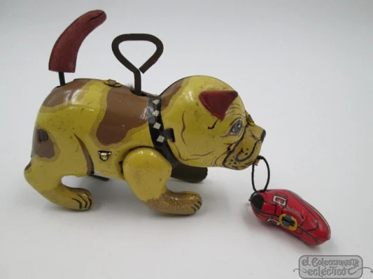 Mechanical bulldog with boot. Wind-up. Japan. 1950's. Lithographed tinplate