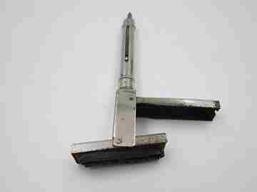 Mechanical combo. Dip pen, retractable pencil and rubber stamp. Silver plated. 1910's