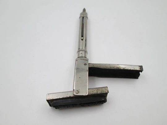 Mechanical combo. Dip pen, retractable pencil and rubber stamp. Silver plated. 1910's