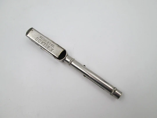 Mechanical combo. Dip pen, retractable pencil and rubber stamp. Silver plated. 1910's