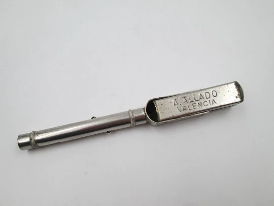 Mechanical combo. Dip pen, retractable pencil and rubber stamp. Silver plated. 1910's