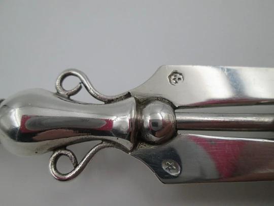 Mechanical fork / clamp for serving bread. 925 sterling silver. Flower on top. 1970's. Spain