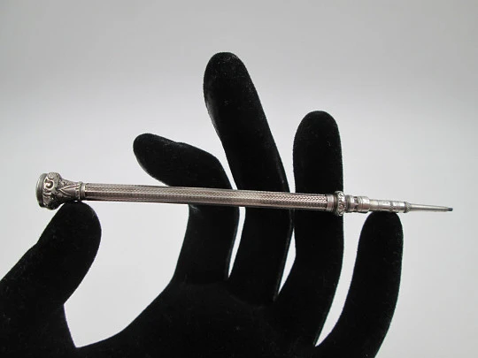 Mechanical propelling pencil. Chiseled sterling silver & nacre. 1900's