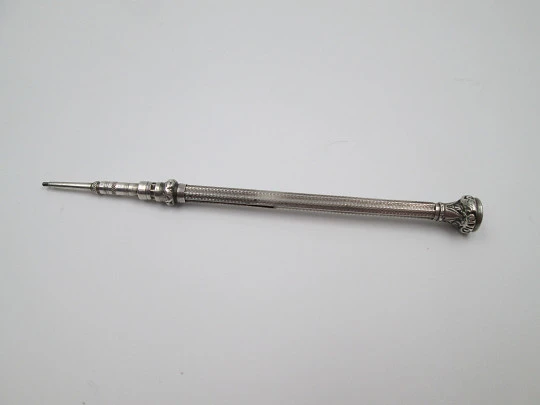 Mechanical propelling pencil. Chiseled sterling silver & nacre. 1900's