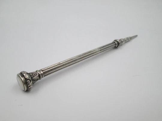 Mechanical propelling pencil. Chiseled sterling silver & nacre. 1900's