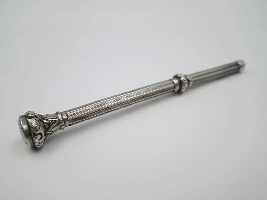 Mechanical propelling pencil. Chiseled sterling silver & nacre. 1900's