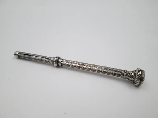 Mechanical propelling pencil. Chiseled sterling silver & nacre. 1900's