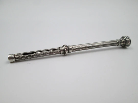 Mechanical propelling pencil. Chiseled sterling silver & nacre. 1900's