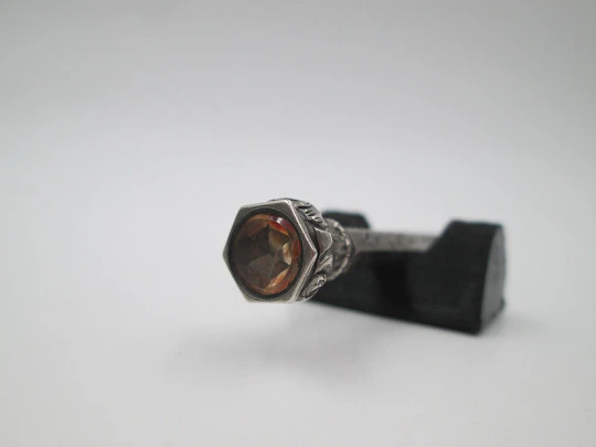 Mechanical propelling twist pencil. Chiselled silver and amber stone. 1900's