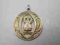Medalla calada Virgen del Pilar. Plata de ley vermeil. España. 1930